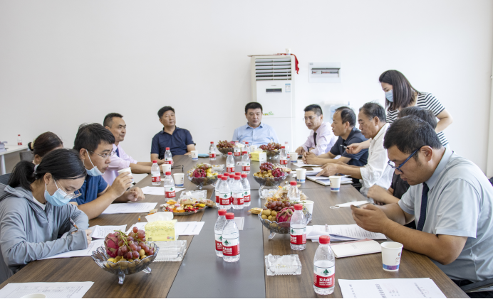 鹤壁市开发区管委副主任郭建勇一行莅临万洲汇召开项目工作推进专题会议